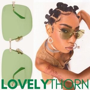 DEZI // ltd ed 2000's inspired rimless green lens gold navigator sunglasses